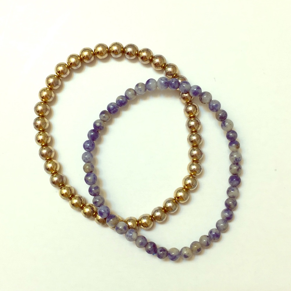 Gold colored bracelet & blue glass bead bracelet